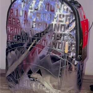 Sprayground Metallic Silver Holographic Shark Backpack